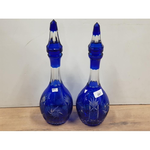 287 - AMAZING PAIR OF BOHEMIAN COBALT CUT TO CLEAR DECANTERS AND STOPPERS