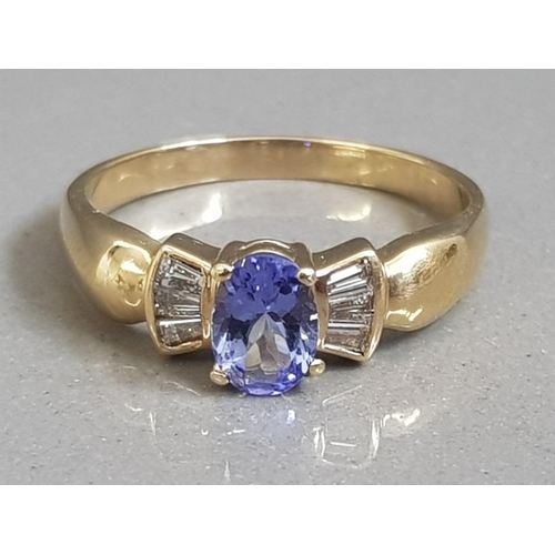 34 - LARGE 14CT GOLD AND 3/4CT OVAL TANZANITE WITH DIAMOND ACCENTS 4G SIZE T