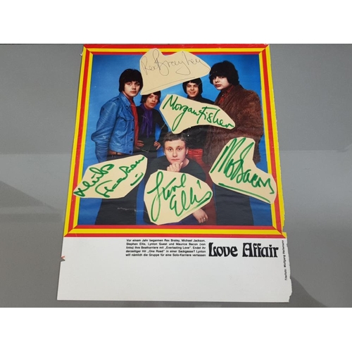 96 - A PAGE TAKEN FROM A GERMAN MAGAZINE FEATURING THE BAND LOVE AFFAIR WITH CLIPPED SIGNATURES IN BLUE A... 