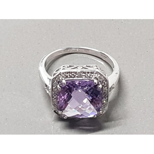 214 - 9CT WHITE GOLD PURPLE AND DIAMOND RING SIZE T 6.6 GRAMS