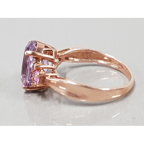 63 - 9CT ROSE GOLD, PURPLE AND PINK STONE RING 3.4G SIZE P