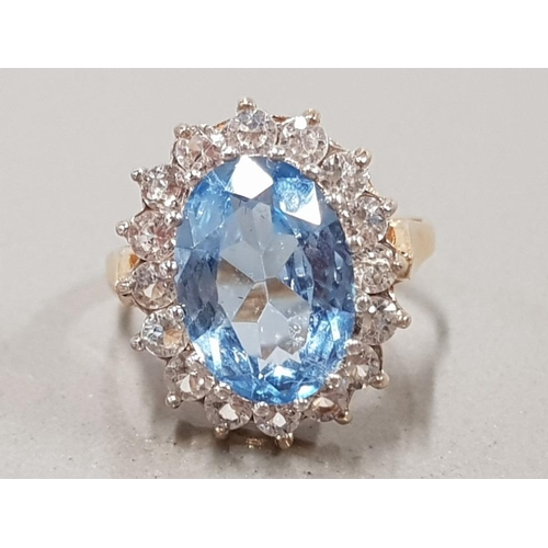 64 - 9CT YELLOW GOLD BLUE STONE AND CUBIC LARGE OVAL CLUSTER RING 6.2G SIZE T1/2