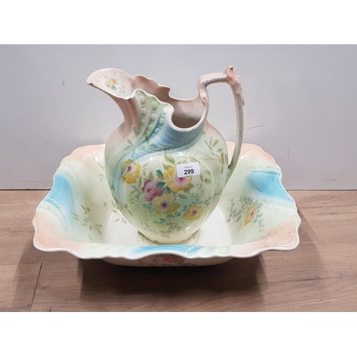 299 - VICTORIAN FLORAL AND BLUSH WASH JUG AND BASIN DAMAGED LIP TO JUG