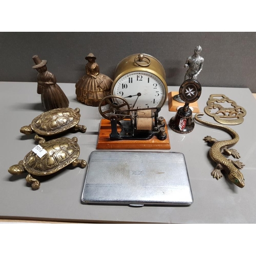 303 - BRASSWARE TO INCLUDE BELLS IN THE SHAPE OF LADIES, A CLOCK, A SMALL ELECTRIC MACHINE, TORTOISE ASHTR... 