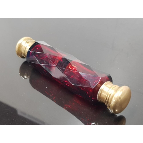 314 - MID LATE VICTORIAN DOUBLE ENDED SCENT BOTTLES IN CRANBERRY GLASS WITH ORIGINAL STOPPERS UNDER CAPS