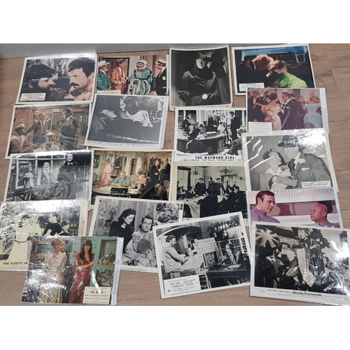 395 - COLLECTION OF 18 FILM STILLS INCLUDES JAMES BOND YOU ONLY LIVE TWICE AND BING CROSBYS ROAD TO MOROCC... 