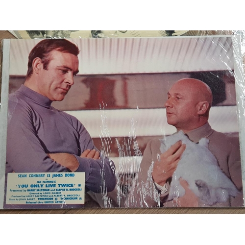 395 - COLLECTION OF 18 FILM STILLS INCLUDES JAMES BOND YOU ONLY LIVE TWICE AND BING CROSBYS ROAD TO MOROCC... 