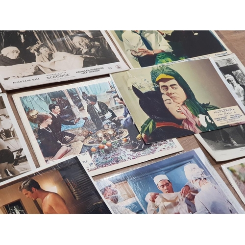 396 - COLLECTION OF 20 FILM STILLS INCLUDES BLOOMFIELD, SCROOGE AND BEDKNOBS AND BROOMSTICKS ETC