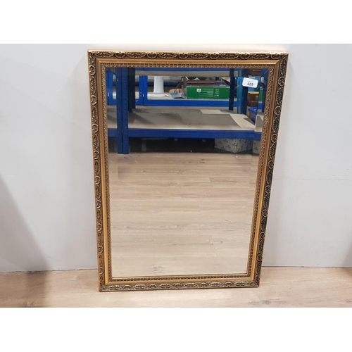 409 - GILT FRAMED BEVELLED EDGE HALL MIRROR, GLASS SIZE 50CM X 73CM