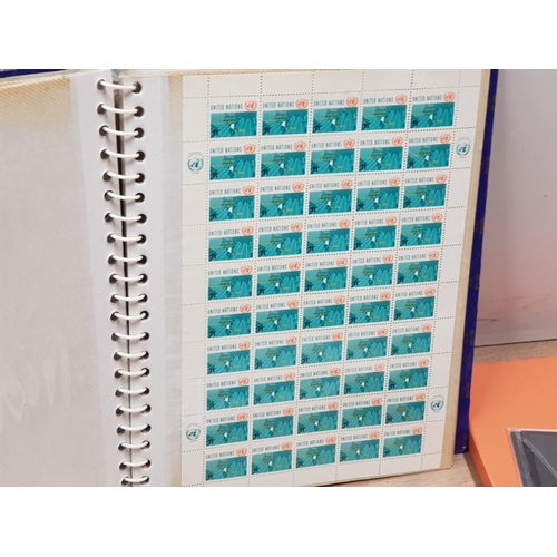 412 - 9 SHEETS OF 1962 UNITED NATIONS STAMPS AND 29 FIRST DAY COVERS, SOME SIGNED BY THE DESIGNER, A PIONE... 