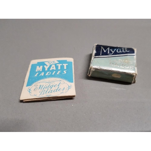 422 - A MYATT MINI LADIES RAZOR, AND A PACKET OF MYATT LADIES MIDGET BLADES