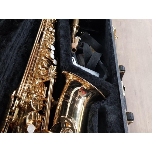 132 - AN ELKHART SERIES II BRASS SAXOPHONE NO 9090289 BOXED