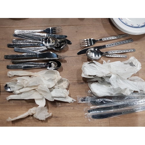 144 - 2 PART DINNER AND TEA SETS WITH 2 DIFFERENT UNUSED CUTLERY SETS