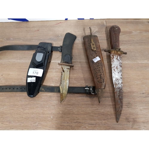 176 - A SCUBA DAGGER NO 107954 AND ANOTHER WITH CARVED WOODEN GRIP AND SHEATH