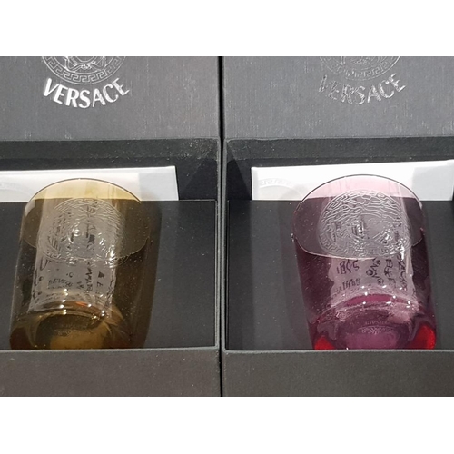 183 - VERSACE FOR ROSENTHAL AMBER AND ROSE GLASS CANDLE HOLDERS WITH COAS IN ORIGINAL BOXES