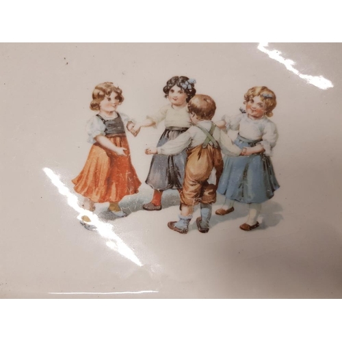 82 - FRENCH JOUGLAS 1930S DOLL PLUS ONE OTHER AND 2 PLATES DEPICTING CHILDREN, RING AROUND THE ROSIE SCEN... 