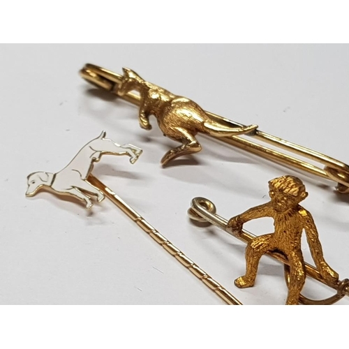 307 - 18KT ENAMEL DOG STICK PIN 1.6G TOGETHER WITH 9CT GOLD KANGAROO BROOCH 5.4G AND SILVER GILT MONKEY BR... 