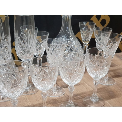 310 - 2 CRYSTAL DECANTERS WITH STOPPERS AND 14 DRINKING GLASSES