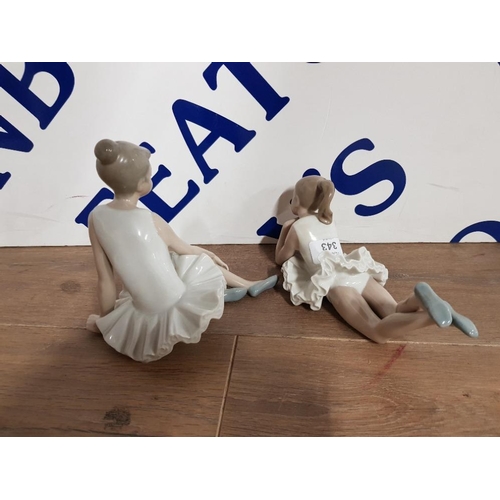 343 - TWO NAO BALLERINAS SEATED AND LAID DOWN