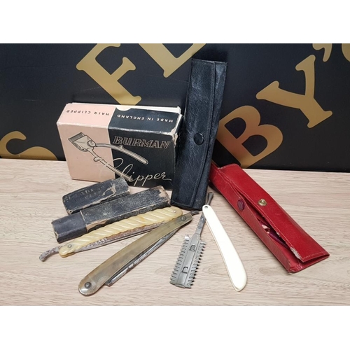 355 - A COLLECTION OF VINTAGE BARBERS EQUIPMENT INCLUDES BOXED BURMAN CLIPPERS, CUT THROAT RAZORS ETC