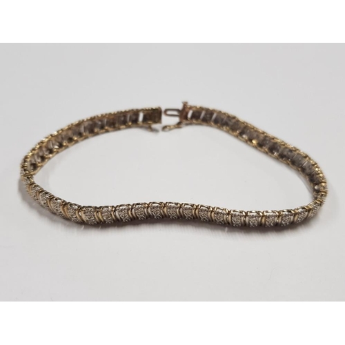 360 - 9CT YELLOW GOLD DIAMOND BRACELET, APPROXIMATELY  .25CTS, 8.5G GROSS