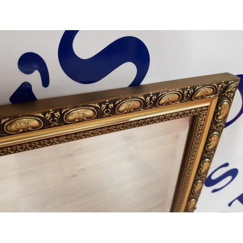 398 - A MODERN BEVELLED WALL MIRROR IN GOLD COLOURED FRAME 60 X 90.5CM