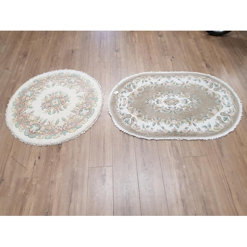 406 - TWO MODERN CHINESE RUGS ONE CIRCULAR 92CM DIAMETER AND ONE OBLONG 123 X 80CM