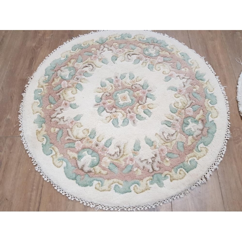 406 - TWO MODERN CHINESE RUGS ONE CIRCULAR 92CM DIAMETER AND ONE OBLONG 123 X 80CM