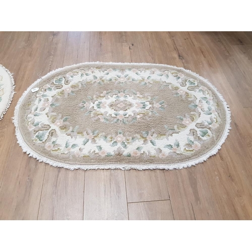 406 - TWO MODERN CHINESE RUGS ONE CIRCULAR 92CM DIAMETER AND ONE OBLONG 123 X 80CM