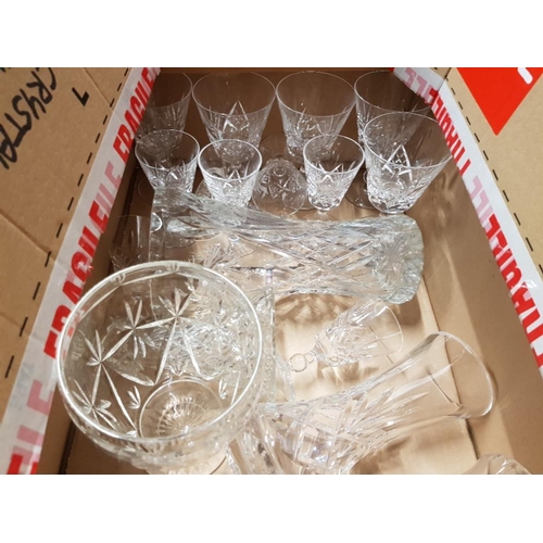 440 - SEVENTEEN PIECES OF CUT CRYSTAL DRINKING GLASSES AND VASES