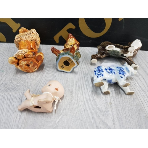 122 - YARE POTTERY SEATED LION A DELFT POTTERY POLAR BEAR KEWPIE TYPE PIANO BABY A RUSHTON POTTERY MANX CA... 