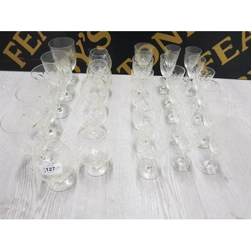 127 - SUITE OF 29 PIECES OF CUT GLASS DRINKING GLASSES INCLUDING 8 LIQUEUR/WINE 6 BRANDY AND 6 GOBLETS