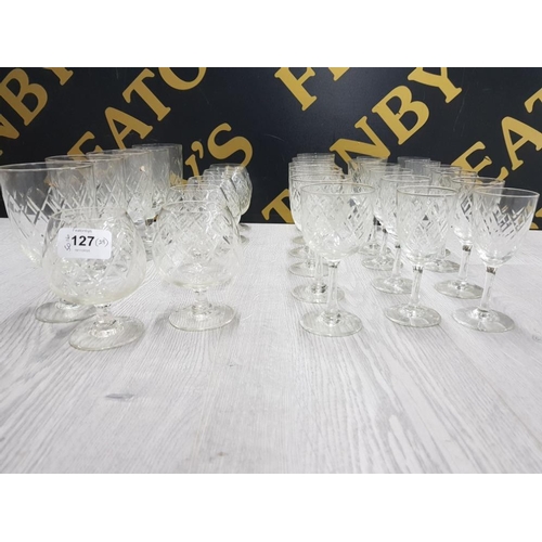 127 - SUITE OF 29 PIECES OF CUT GLASS DRINKING GLASSES INCLUDING 8 LIQUEUR/WINE 6 BRANDY AND 6 GOBLETS