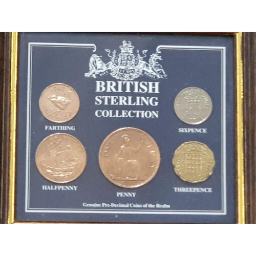 165 - COLLECTION OF BRITISH FRAMED COIN AND STAMP SETS