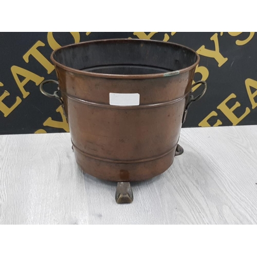 168 - COPPER AND BRASS HANDLED COAL BUCKET ON TRIPOD FEET TOGETHER WITH ONE OTHER