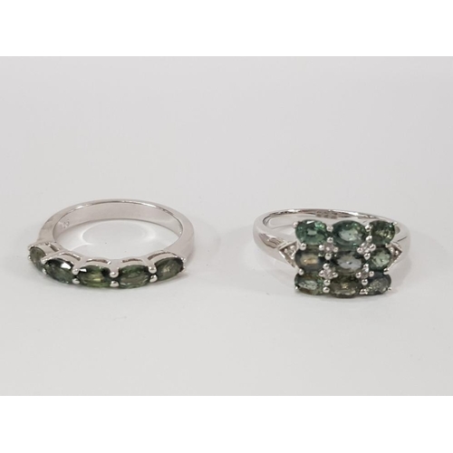 186 - FOUR SILVER AND GREEN STONE RINGS OF VARIOUS DESIGNS STAMPED SIZES R 1/2 AND T 1/2 18.1 G GROSS