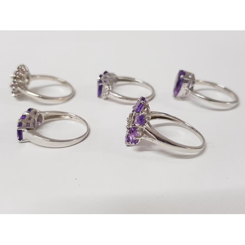 187 - FIVE SILVER AND PURPLE STONE RINGS OF VARIOUS DESIGNS STAMPED SIZES P R 1/2 AND T 1/2 17G GROSS