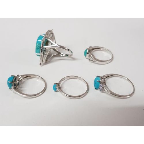 188 - FIVE SILVER AND TURQUOISE RINGS STAMPED SIZES R 1/2 S AND U 19.9G GROSS