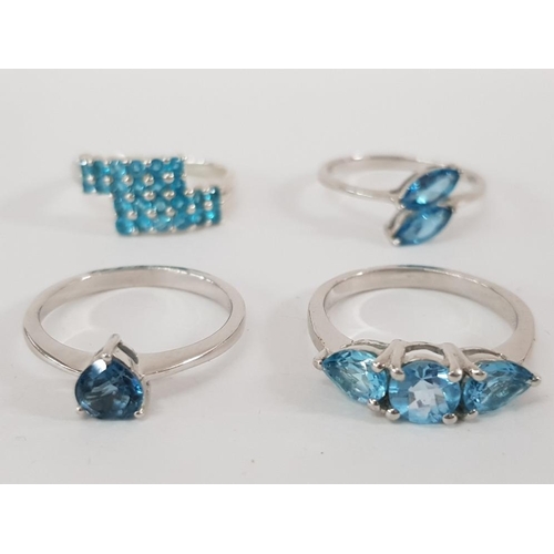 189 - FOUR SILVER AND BLUE STONE RINGS STAMPED SIZES R R 1/2 AND S 11G GROSS