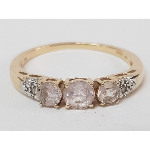 195 - A 9CT YELLOW GOLD PINK STONE AND DIAMOND RING SIZE U 2.4G GROSS