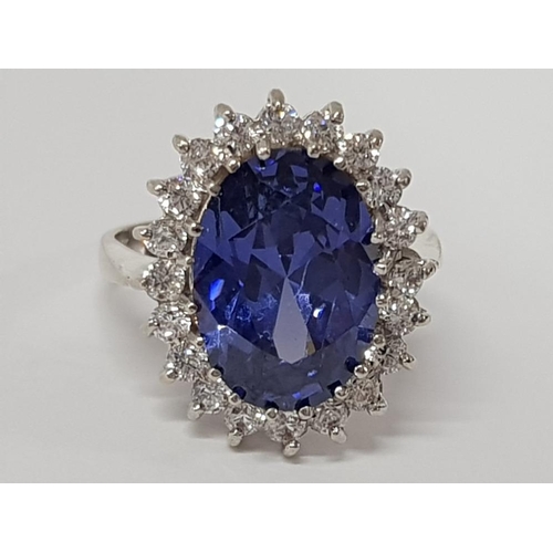 199 - 9CT WHITE GOLD CUBIC ZIRCONIA AND TANZANITE OVAL CLUSTER RING, 6G SIZE N