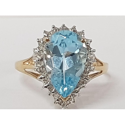 202 - 9CT YELLOW GOLD AQUAMARINE PEAR SHAPE CUBIC ZIRCONIA RING, 3.4G GROSS SIZE S1/2