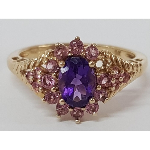 203 - 9CT YELLOW GOLD PURPLE AND PINK STONE CLUSTER RING, 2.7G SIZE O