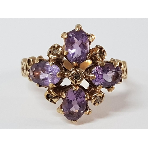 220 - 9CT YELLOW GOLD PURPLE STONE CLUSTER RING, 3.7G SIZE O