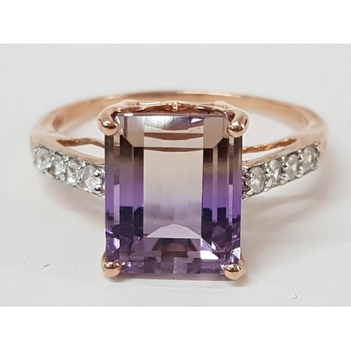 232 - A 9CT ROSE GOLD PURPLE AND WHITE STONE RING T 1/2 3.5G GROSS