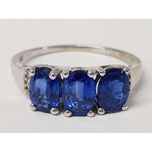 239 - A 9CT WHITE GOLD BLUE STONE AND DIAMOND RING SIZE S 3G GROSS