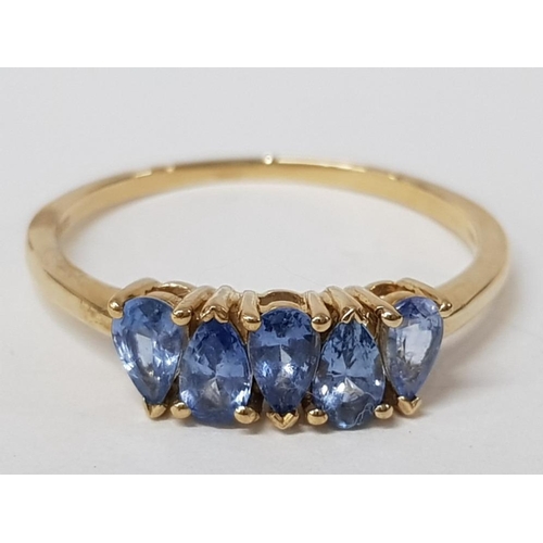 240 - A 9CT YELLOW GOLD AND BLUE STONE RING T 1/2 2G GROSS