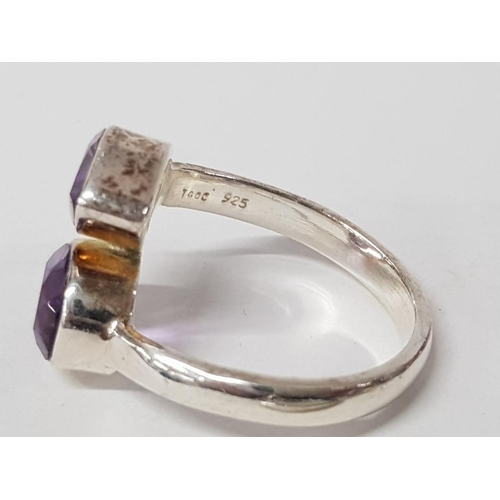 241 - FOUR SILVER AND PURPLE STONE RINGS STAMPED SIZES R 1/2 T 1/2 AND U 15.8G GROSS