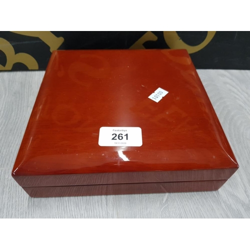 261 - A LAMINATE AND LEATHER EFFECT RING DISPLAY CASE BY GEMPHORA