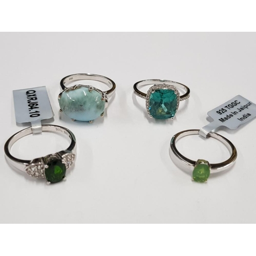 291 - FOUR SILVER BLUE AND GREEN STONE RINGS STAMPED TWO WITH SHOP TAGS SIZES R 1/2 T AND U 15.1G GROSS